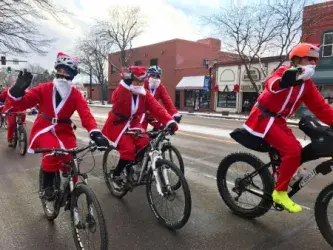 images.raceentry.com/infopages1/chasing-santacycling-santa-infopages1-3833.webp