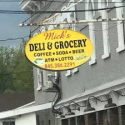 Mick's Deli & Grocery logo