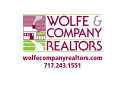 Wolfe & Company Realtors logo